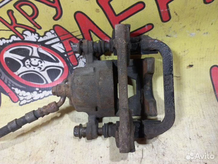 Суппорт тормозной задний правый Nissan Teana J31