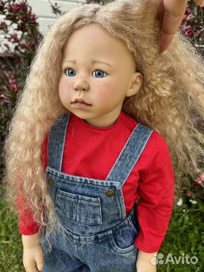 Виниловая кукла