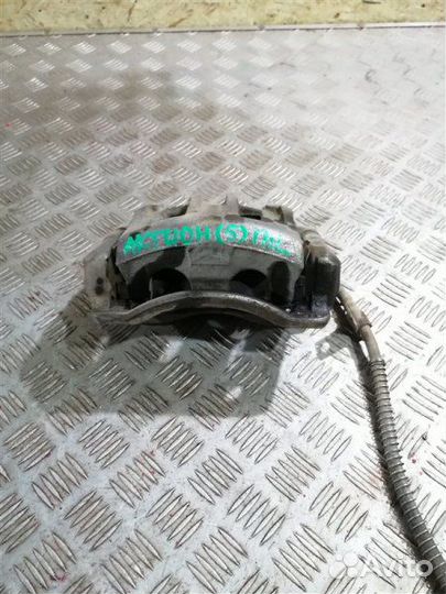 Суппорт тормозной передний левый Ssangyong Actyon