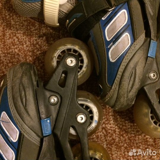 Роликовые коньки