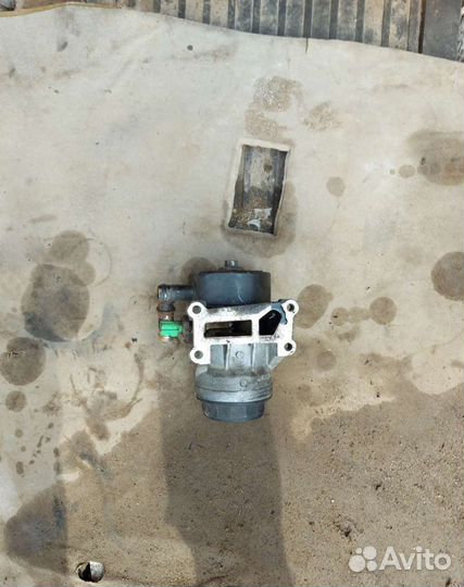 Крепления Масляного фильтра Мазда cx7 2.3