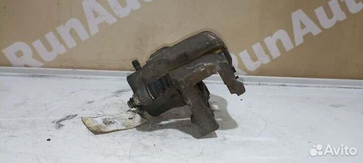 Суппорт тормозной левый Nissan Teana J31 VQ23 VQ35