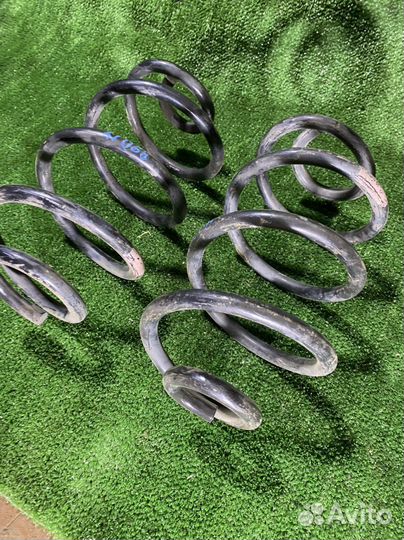 Пружина Nissan note e11 задняя