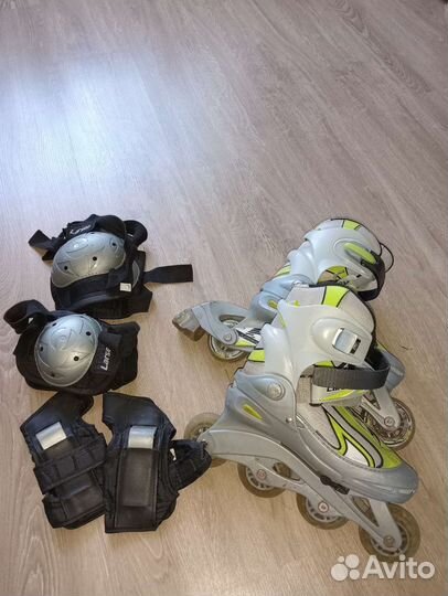 Роликовые коньки