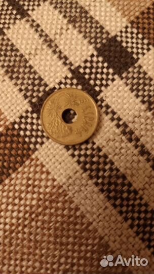 Испанская монета 25