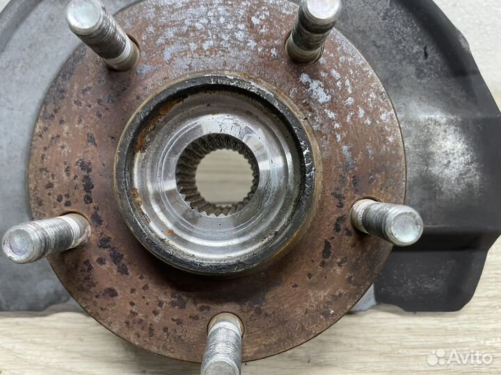 Кулак левый передний Mitsubishi Lancer 10