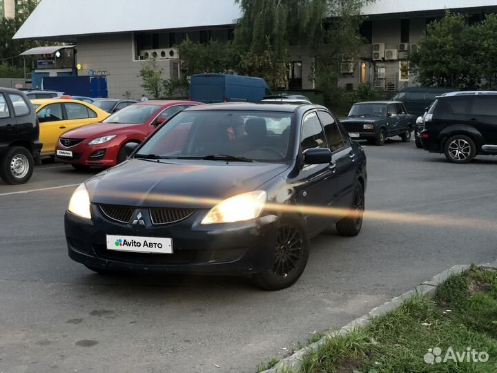 Mitsubishi Lancer 1.6 МТ, 2004, 261 000 км