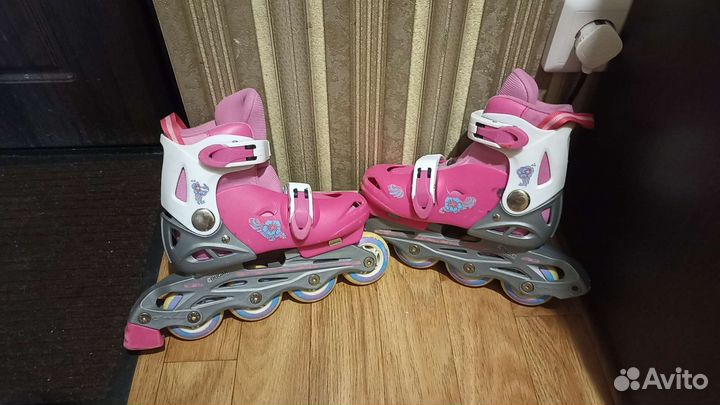 Роликовые коньки