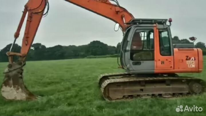 Услуги гусеничного эксковатора