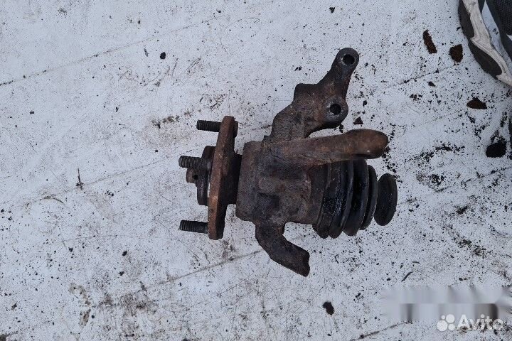 Кулак поворотный левый nissan almera N16 рестайлин