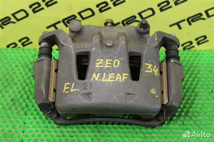 Суппорт тормозной передний левый Nissan Leaf ZE0