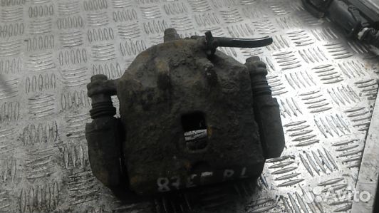 Суппорт тормозной передний левый hyundai tucson JM