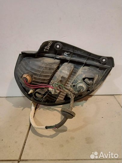 Фонарь toyota duet m111a koito 22061580