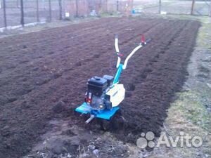 Вспашка земли мотоблоком