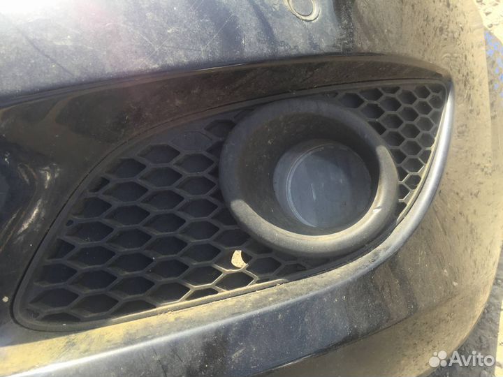 Бампер передний Opel Zafira Family рест. 2010