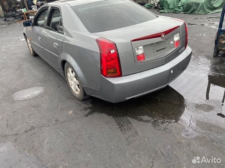 Тросик капота Cadillac Cts