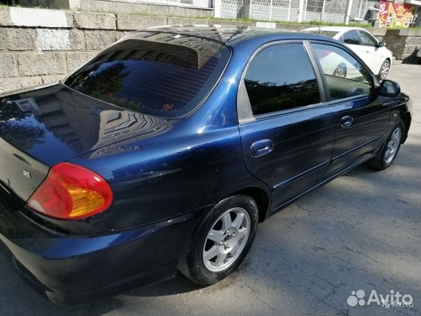 Бампер задний KIA Spectra темно-синий-471