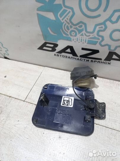 Лючок бензобака Kia Spectra