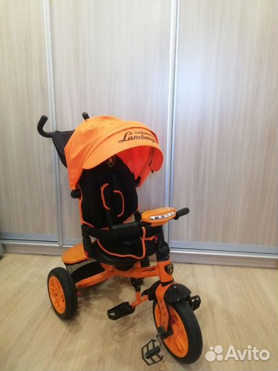 Детский трехколесный велосипед с ручкой