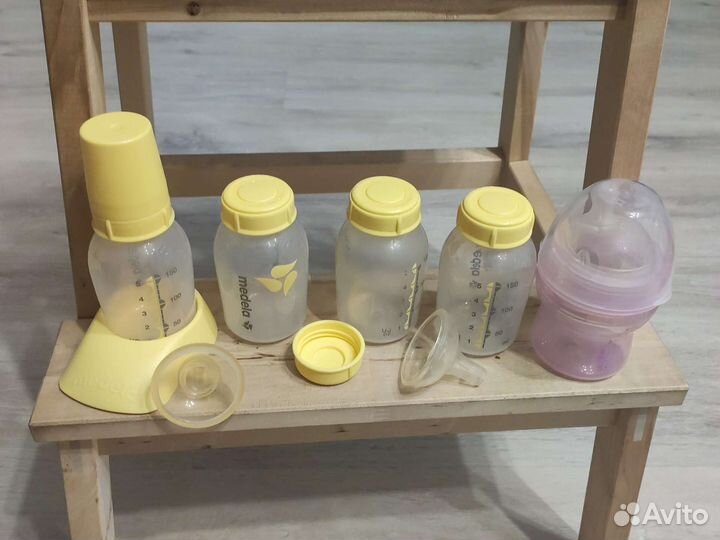 Молокоотсос medela электрический