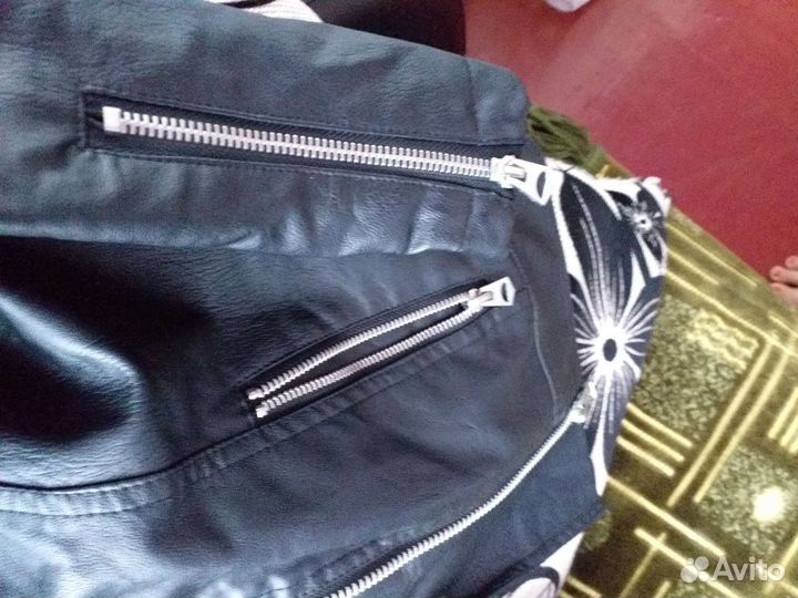 Куртки новые