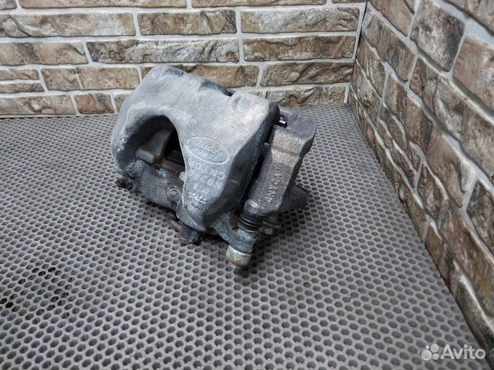 Суппорт тормозной передний правый Land Rover