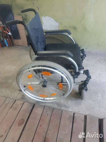 Инвалидная коляска