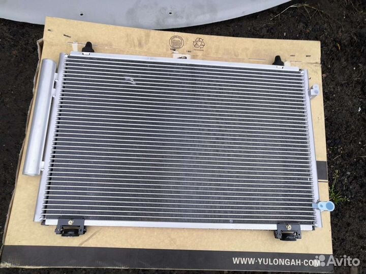 Радиатор кондиционера Geely Emgrand