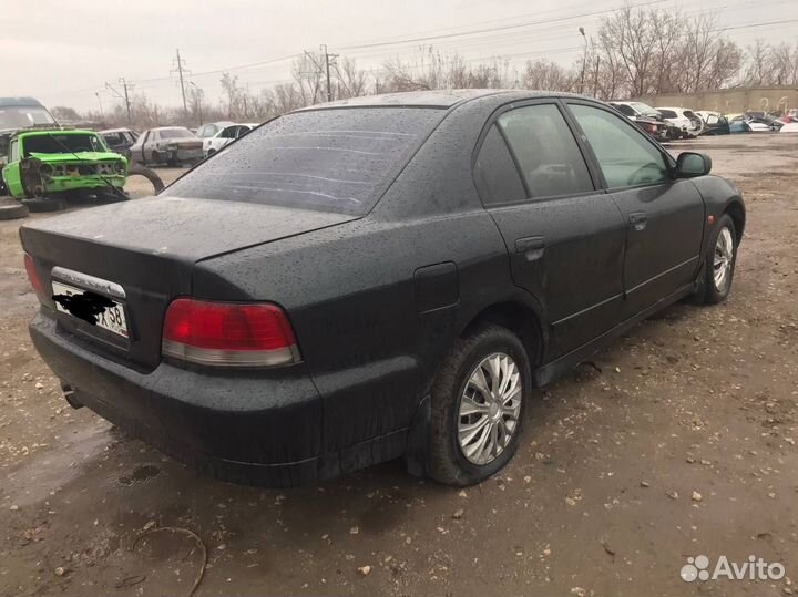 Суппорт передний левый Mitsubishi Galant 8