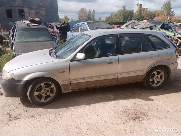 Решетка радиатора Mazda 323 BJ