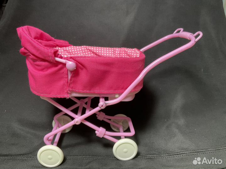 Коляска и пупсы