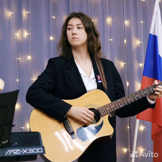 Учитель гитары и укулеле