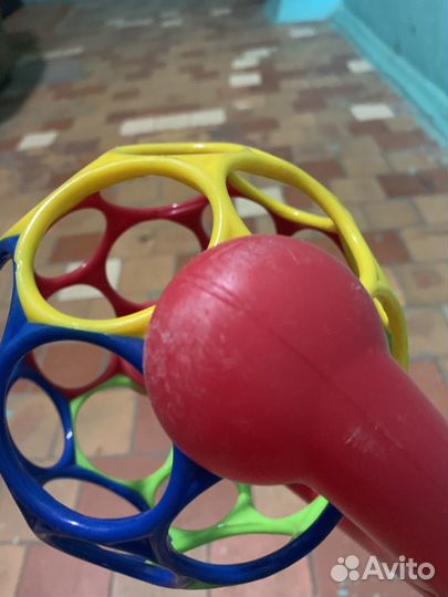 Игрушка каталка с ручкой