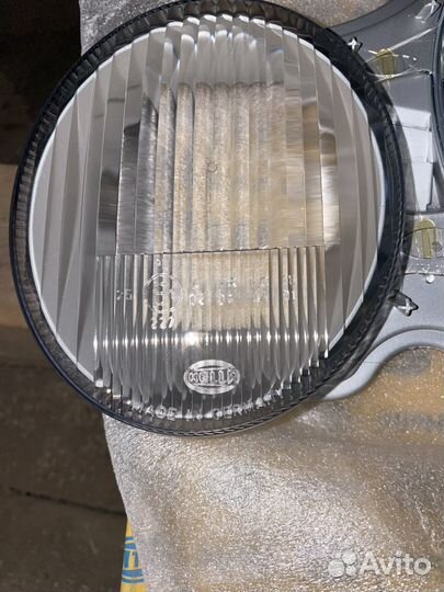 Стекло передней фары Mercedes Benz E W210
