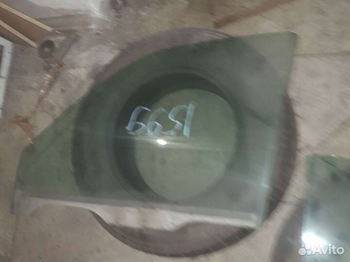 Стекло двери передней Киа Спортейдж 1