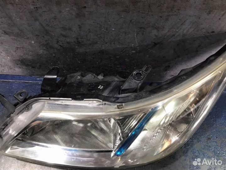 Фара ксенон левая Subaru Exiga Y10
