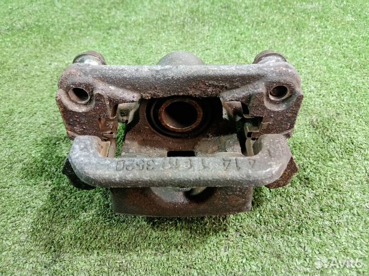 Суппорт тормозной задний левый Nissan X-Trail NT31