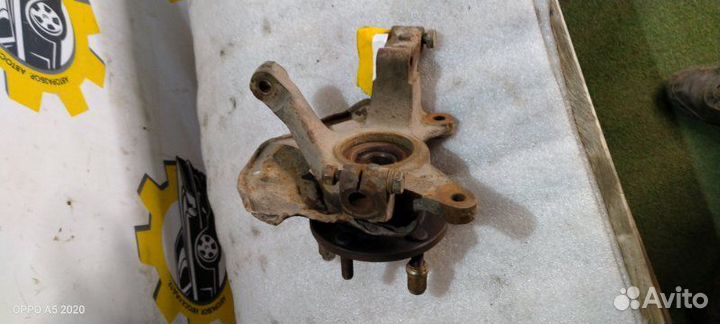 Кулак поворотный передний левый Mazda 626 1998