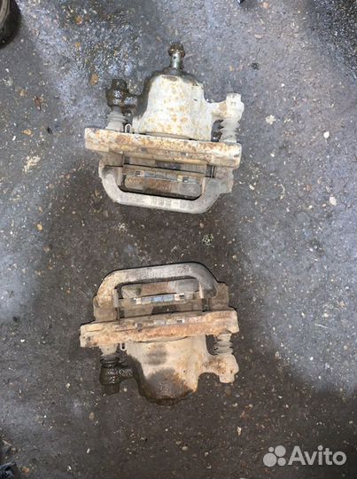 Суппорт тормозной задний Nissan Qashqai J10