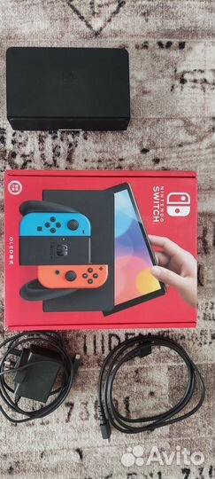 Nintendo Switch oled 64gb + 2 игры и переходник