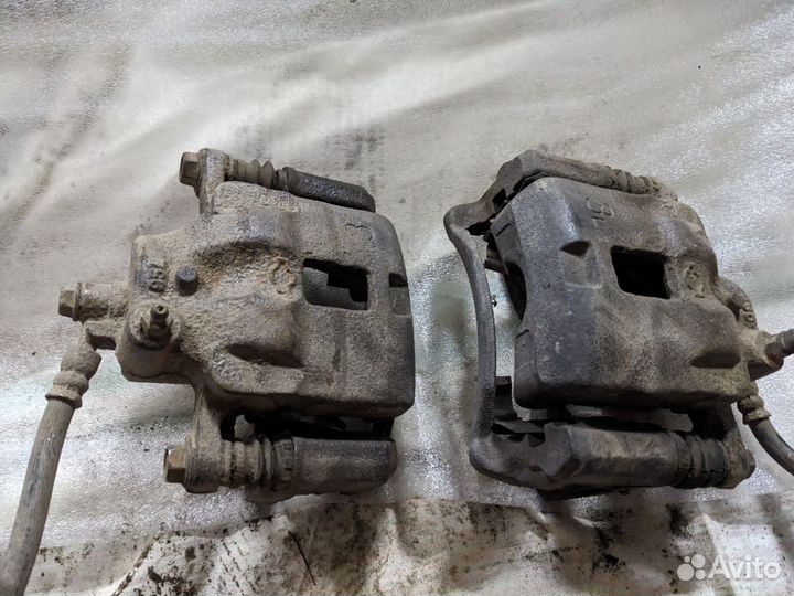 Суппорта передние Nissan Almera N15