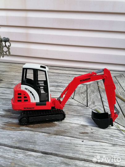 Брудер bruder экскаватор schaeff