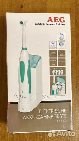 Электрическая зубная щетка новая