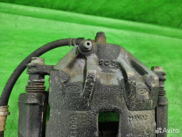 Суппорт передний правый Tucson / Sportage 04-10