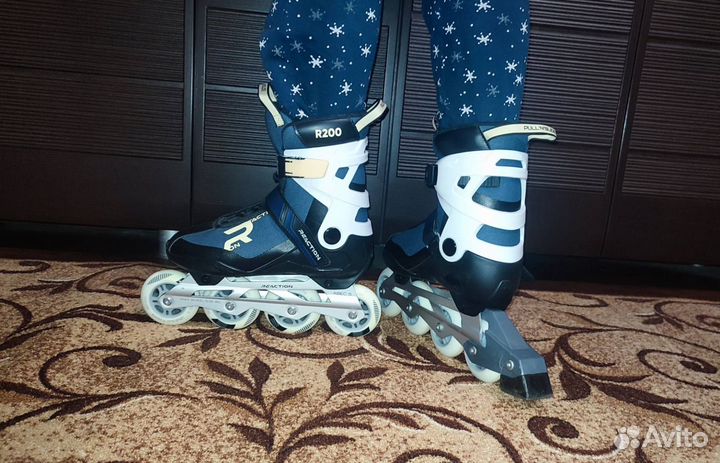 Роликовые коньки