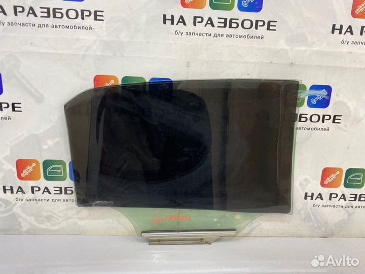 Стекло двери заднее левое Toyota Corolla E150