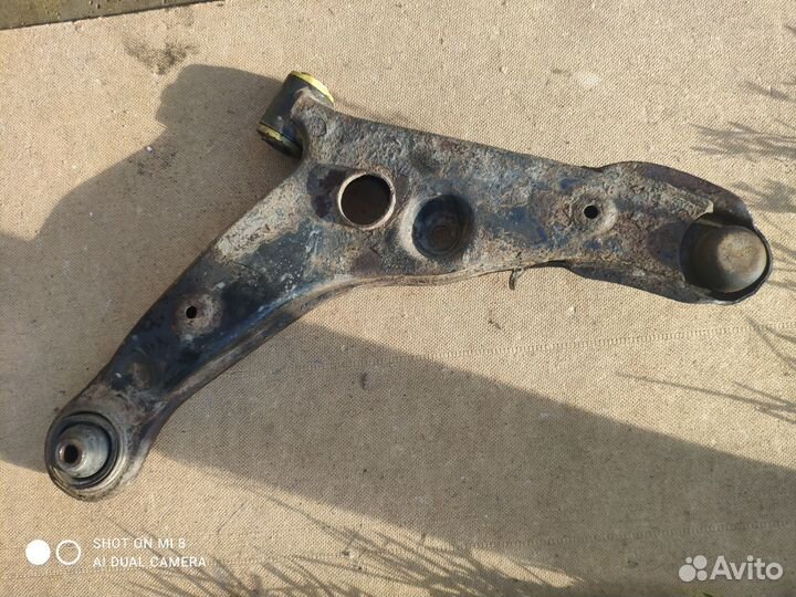 Нижний передний рычаг Митсубиси outlander 1