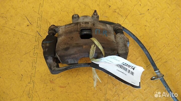 Суппорт передний L200 (KB) 4605A202