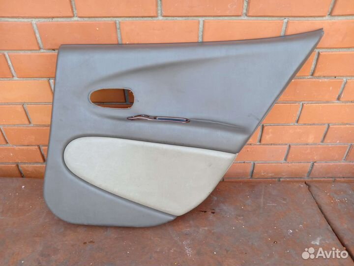 Дверная обшивка задняя правая на даево леганза 2.0