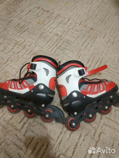 Роликовые коньки